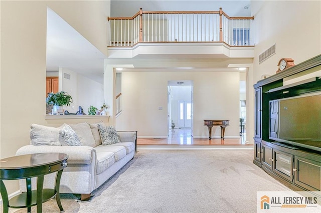 2 Kristen Ct, Franklin, NJ 08873 - carpeted living room with a towering ceiling