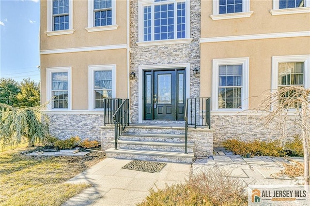 2 Kristen Ct, Franklin, NJ 08873 - property entrance with stone siding and stucco siding