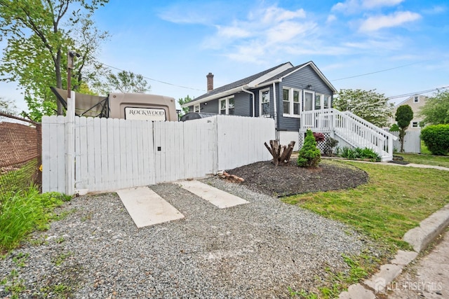 5 Wedgewood Ave, Woodbridge Proper, NJ 07095 - view of side of home featuring a gate and a chimney