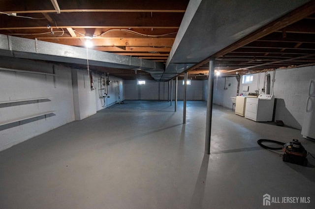 basement featuring washer and dryer