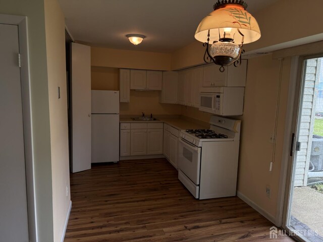 5 Texas Ct Unit B, Old Bridge, NJ 07747 - kitchen with white appliances, dark wood finished floors, white cabinetry, and a sink