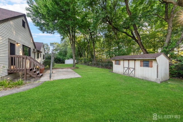 39 Miara St, Sayreville, NJ 08859 - view of yard with a storage unit and a patio area