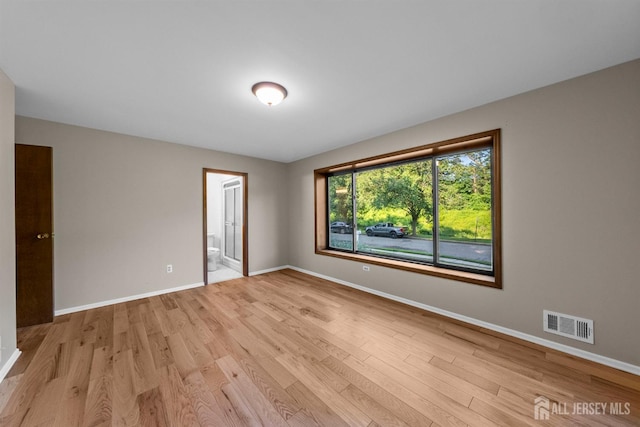 39 Miara St, Sayreville, NJ 08859 - empty room with light wood-style flooring and baseboards
