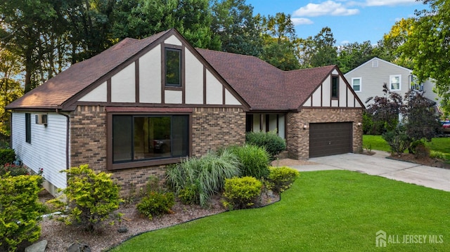 39 Miara St, Sayreville, NJ 08859 - tudor house with driveway, a front yard, a garage, roof with shingles, and brick siding