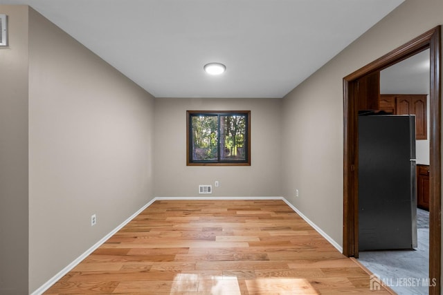 39 Miara St, Sayreville, NJ 08859 - empty room with light wood finished floors and baseboards
