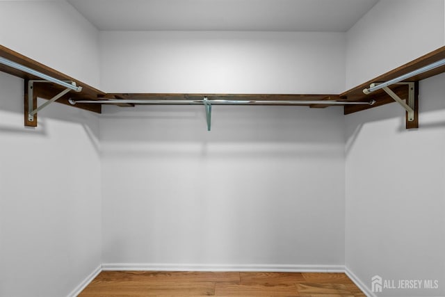 39 Miara St, Sayreville, NJ 08859 - walk in closet featuring wood finished floors