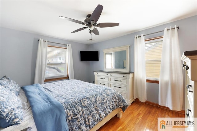 49 Paul St, Fords, NJ 08863 - bedroom with light wood-type flooring and a ceiling fan