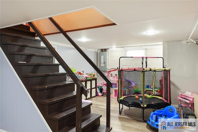 49 Paul St, Fords, NJ 08863 - stairway with wood finished floors and electric panel