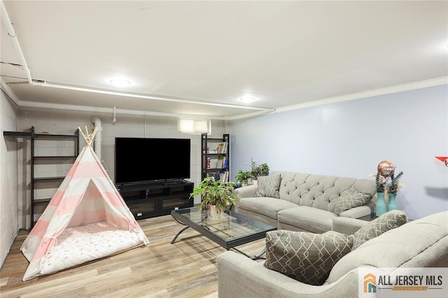 49 Paul St, Fords, NJ 08863 - living room with wood finished floors, ornamental molding, and recessed lighting