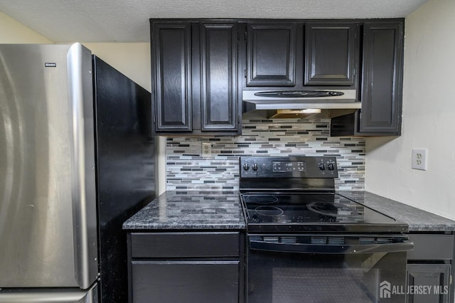 kitchen featuring dark countertops, black / electric stove, freestanding refrigerator, and under cabinet range hood