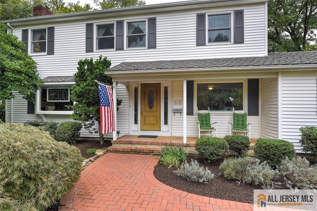 view of front of home featuring covered porch