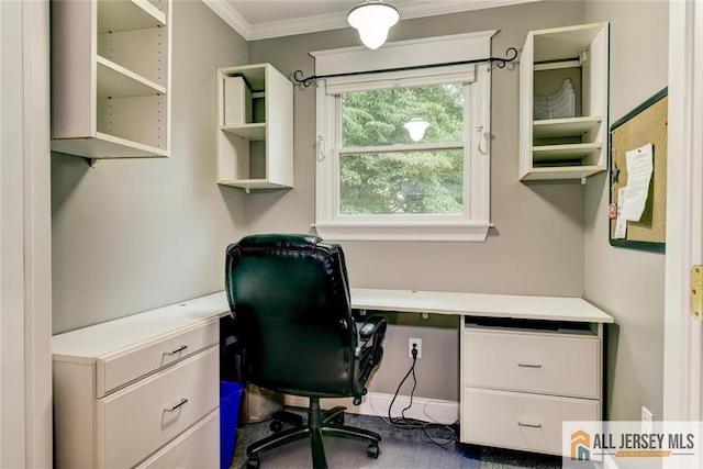 office featuring crown molding and built in desk