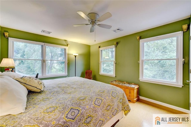 bedroom featuring ceiling fan