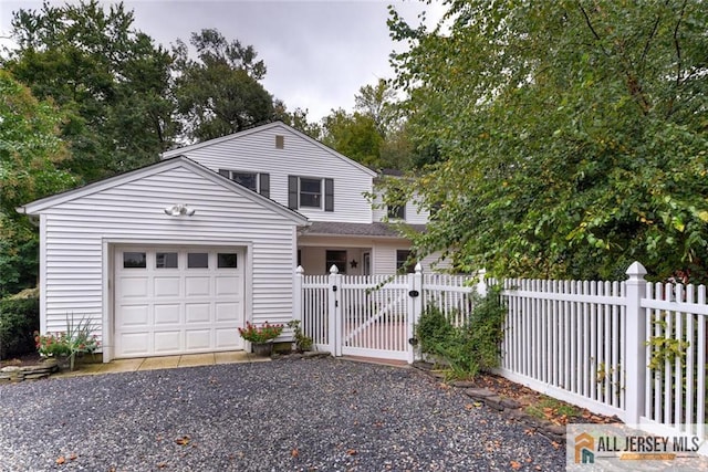 front facade with a garage