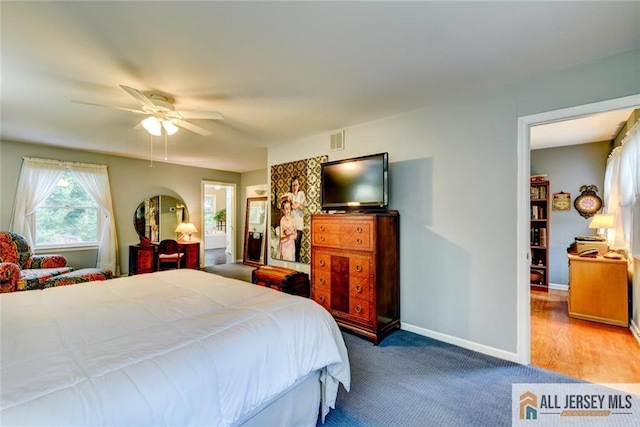 bedroom featuring light wood-type flooring and ceiling fan