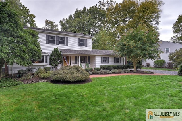 view of front of home with a front yard