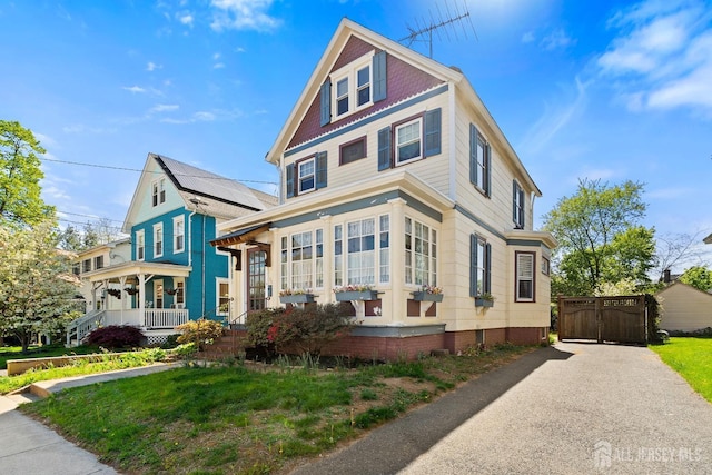 22 Booream Ave, Milltown, NJ 08850 - victorian-style house with a gate, crawl space, and covered porch