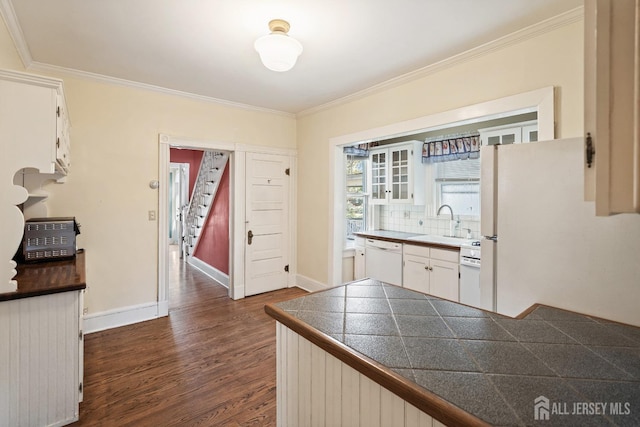 22 Booream Ave, Milltown, NJ 08850 - kitchen featuring decorative backsplash, dark wood-style flooring, crown molding, white appliances, and white cabinetry