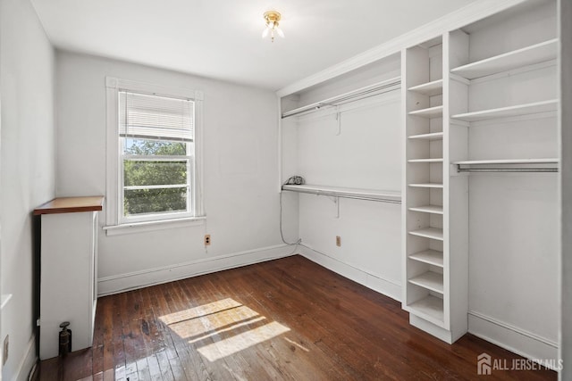 22 Booream Ave, Milltown, NJ 08850 - unfurnished bedroom with baseboards and hardwood / wood-style flooring