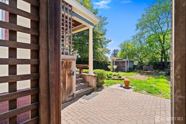 22 Booream Ave, Milltown, NJ 08850 - view of patio featuring an outbuilding and a shed