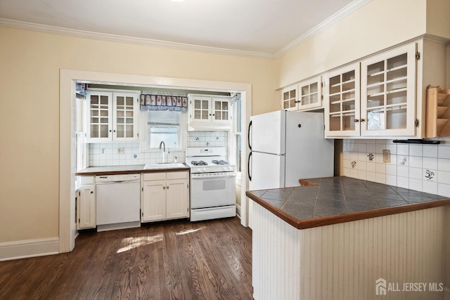 22 Booream Ave, Milltown, NJ 08850 - kitchen featuring a sink, white appliances, a peninsula, decorative backsplash, and glass insert cabinets