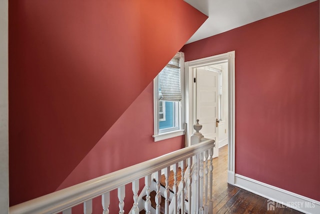22 Booream Ave, Milltown, NJ 08850 - hallway featuring baseboards, dark wood finished floors, and an upstairs landing