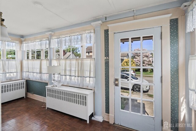 22 Booream Ave, Milltown, NJ 08850 - sunroom with radiator heating unit and healthy amount of natural light
