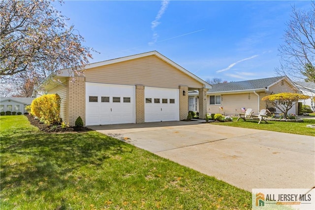 737 Prospect Rd Unit 737A, Monroe, NJ 08831 - single story home with brick siding, a front lawn, and a detached garage