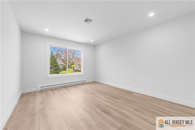 737 Prospect Rd Unit 737A, Monroe, NJ 08831 - empty room featuring baseboard heating, light wood-style floors, baseboards, and recessed lighting