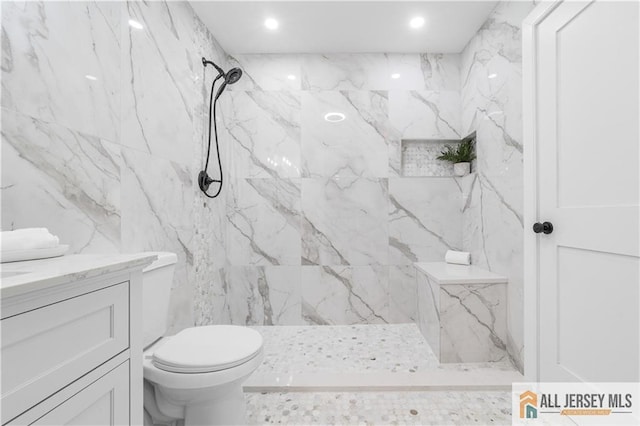 737 Prospect Rd Unit 737A, Monroe, NJ 08831 - full bath featuring a marble finish shower, toilet, vanity, tile walls, and recessed lighting