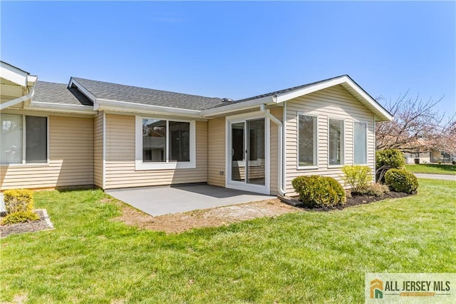 737 Prospect Rd Unit 737A, Monroe, NJ 08831 - rear view of house featuring a patio, a yard, and roof with shingles