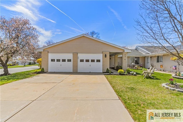 737 Prospect Rd Unit 737A, Monroe, NJ 08831 - ranch-style home with brick siding, a front yard, concrete driveway, and an attached garage
