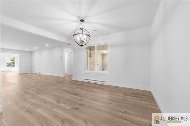 737 Prospect Rd Unit 737A, Monroe, NJ 08831 - unfurnished living room with baseboard heating, a chandelier, light wood-type flooring, baseboards, and recessed lighting