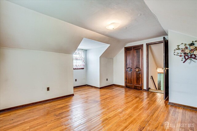 6 N Minnisink Ave, Sayreville, NJ 08859 - bonus room with light wood finished floors, lofted ceiling, and baseboards