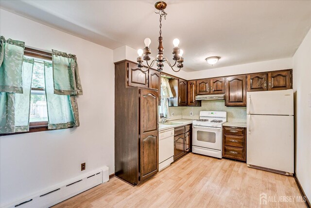 6 N Minnisink Ave, Sayreville, NJ 08859 - kitchen featuring white appliances, a baseboard radiator, under cabinet range hood, light countertops, and a chandelier