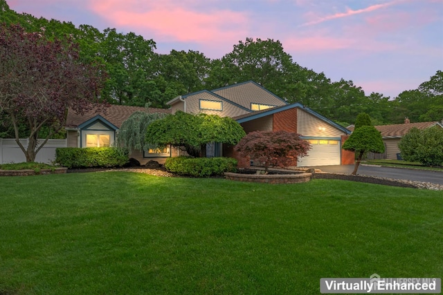 28 Sugarbush Rd, Howell, NJ 07731 - view of front of house with asphalt driveway and an attached garage