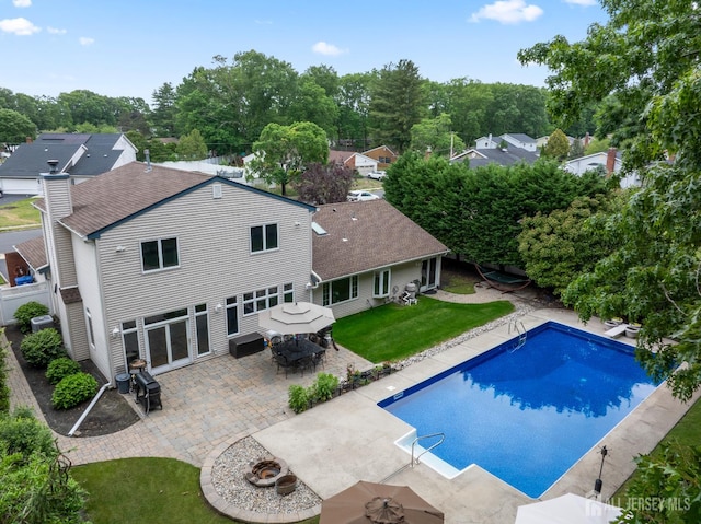 28 Sugarbush Rd, Howell, NJ 07731 - swimming pool with a fire pit, a patio, and outdoor dining space