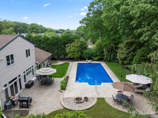 28 Sugarbush Rd, Howell, NJ 07731 - swimming pool with outdoor dining space, a patio, and a lawn