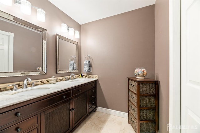 28 Sugarbush Rd, Howell, NJ 07731 - bathroom featuring double vanity and marble look tile flooring