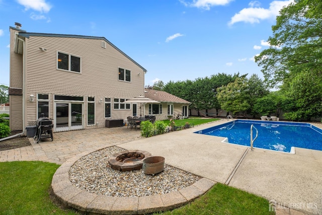 28 Sugarbush Rd, Howell, NJ 07731 - view of swimming pool featuring an outdoor fire pit and a patio