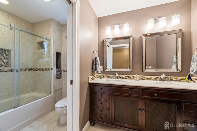 28 Sugarbush Rd, Howell, NJ 07731 - bathroom featuring double vanity and shower / bath combination with glass door