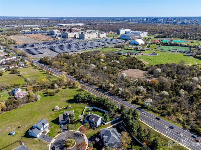 12 Carriage Dr, Piscataway, NJ 08854 - aerial view of property and surrounding area with a tree filled landscape