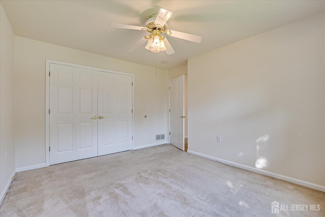 12 Carriage Dr, Piscataway, NJ 08854 - unfurnished bedroom featuring carpet floors, baseboards, and a closet