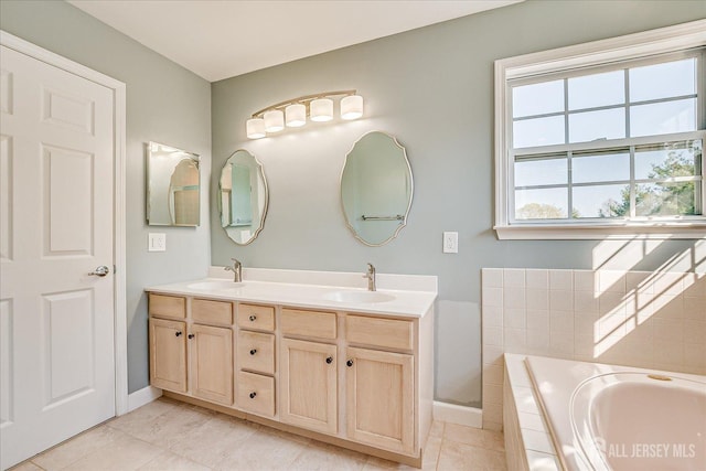 12 Carriage Dr, Piscataway, NJ 08854 - full bath featuring tile patterned flooring, a bath, double vanity, and baseboards