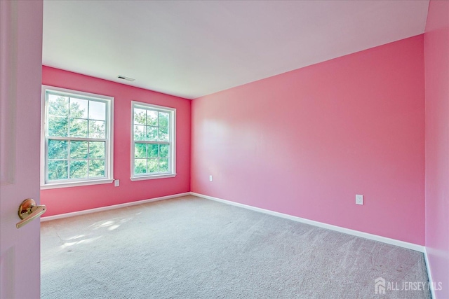 12 Carriage Dr, Piscataway, NJ 08854 - spare room with carpet floors and baseboards