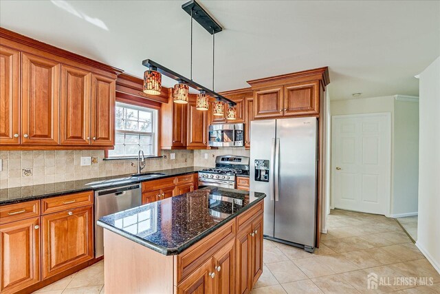 12 Carriage Dr, Piscataway, NJ 08854 - kitchen featuring appliances with stainless steel finishes, a sink, light tile patterned floors, and backsplash