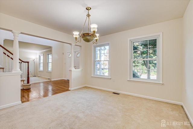 12 Carriage Dr, Piscataway, NJ 08854 - unfurnished room with carpet, baseboards, stairs, and a chandelier