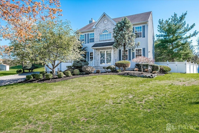 12 Carriage Dr, Piscataway, NJ 08854 - view of front facade featuring a chimney