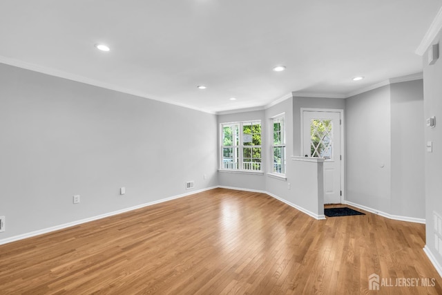 242 Hawthorne Rd, North Brunswick, NJ 08902 - empty room featuring light wood-style floors, recessed lighting, and ornamental molding