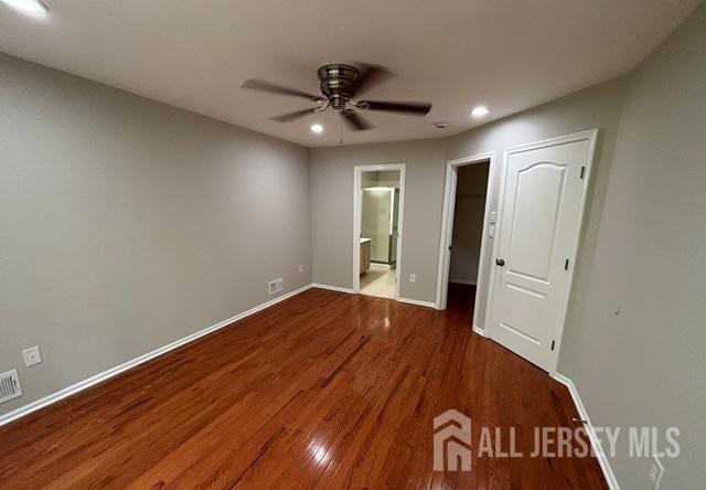 242 Hawthorne Rd, North Brunswick, NJ 08902 - unfurnished bedroom featuring wood finished floors, baseboards, recessed lighting, ensuite bath, and a ceiling fan